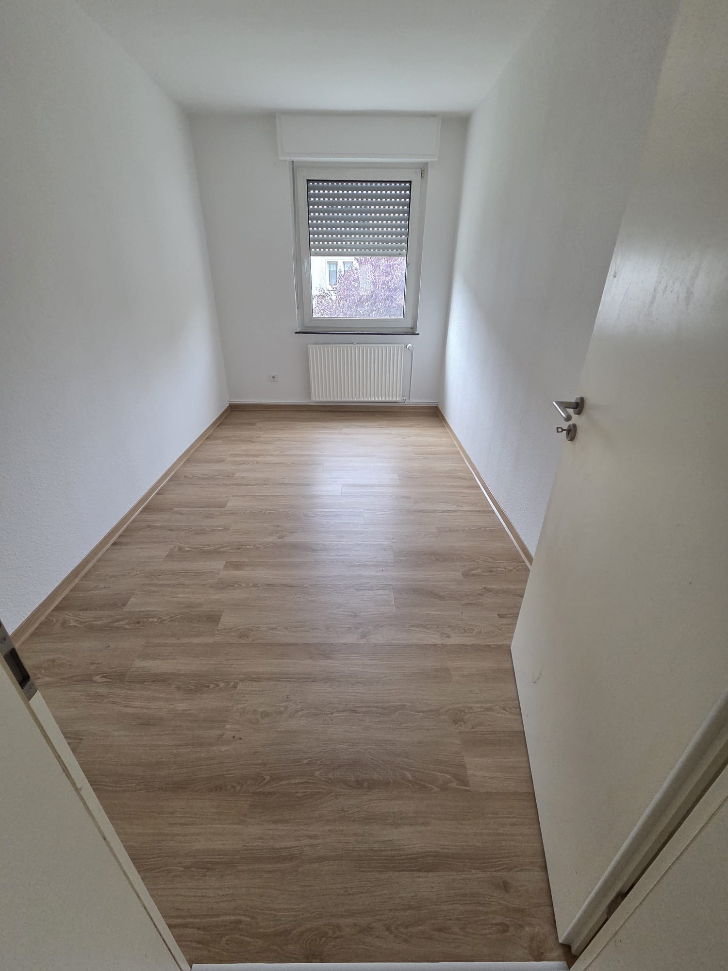 Geräumter und renovierter Wohnraum nach der Entrümpelung